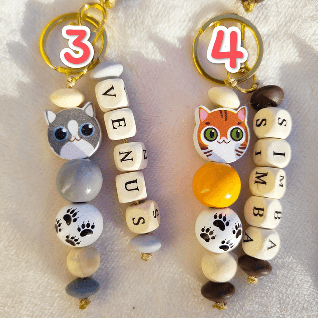 Porte-clés/Bijou de sac personnalisé/motif chat/perles têtes de chat/perles pattes de chat/fait main/créa2claire 