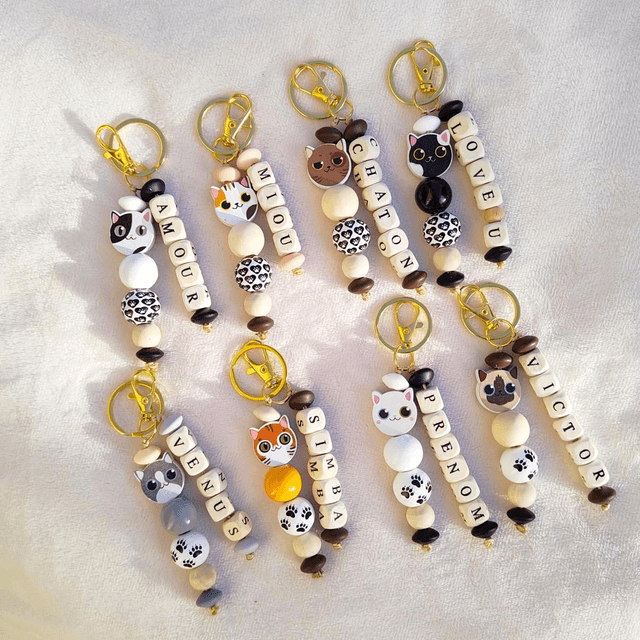 Porte-clés/Bijou de sac personnalisé/motif chat/perles têtes de chat/perles pattes de chat/fait main/créa2claire 